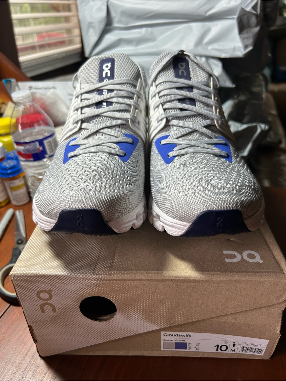 On Running Light Gray and Blue Men's Running Shoes